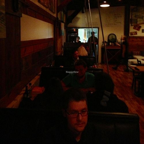 cool booths & atmosphere at Om Cafe - Traverse City in Traverse City