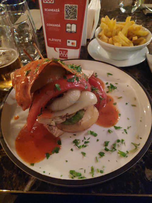 burger and fries at Hanul Lui Manuc in Bucharest