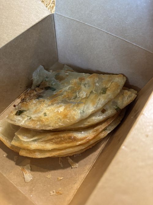 Green onion pancake (half eaten )   at Cha Community in Temple
