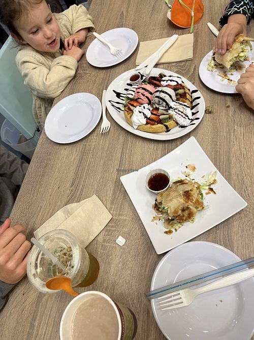 Waffle with ice cream was exciting  at Happiness Cafe in San Jose