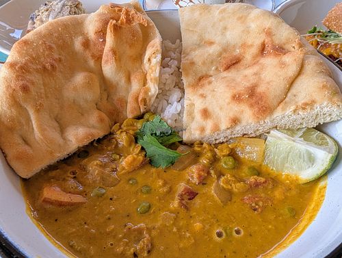 Coconut Curry with Naan at The Wylde Beet in Hailey