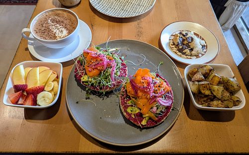 Fruit Salad, Hot Cocoa, Rainbow Bagel, Seasoned Potatoes, Chocolate Chip Cookie at The Wylde Beet in Hailey