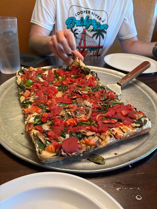 Large veggie pizza with vegan cheese at Toni's Pizza in Mount Pleasant