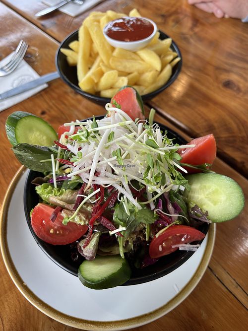 Managed to find a yummy salad and chips 😊  at The Grape Escape Cafe in Richmond