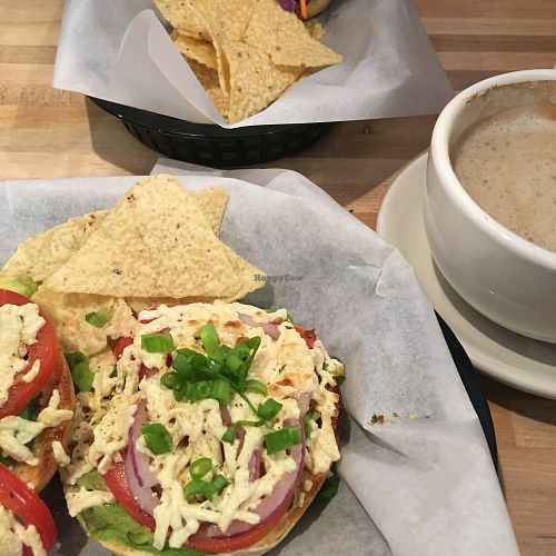 Bagel with avocado tomato onion and melted vegan cheese at Sprouts Natural Foods Cafe in South Lake Tahoe