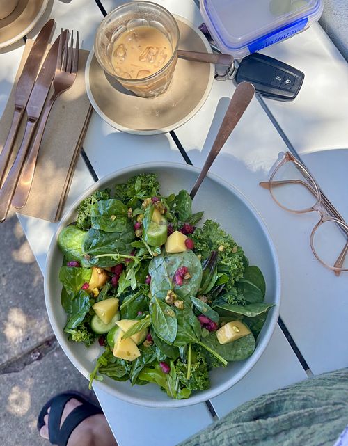 Mango + pomegranate salad and an iced coffee  at Convoy Commune in Merewether