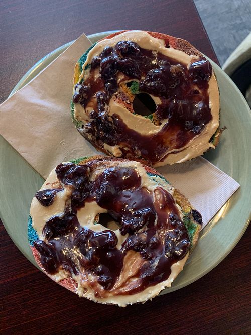 Rainbow bagel with PB & chocolate covered Jerry—makes me proud!  at Crumhorn Coffee House in Oneonta