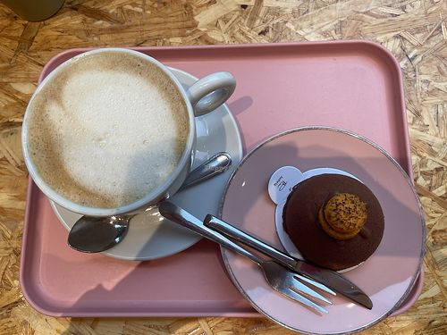 I had a large Cappuccino (Choice of almond and oat milk) and a very tasty chocolate-mousse-almond-thingy; very cute and cool atmosphere!  at Pâtisserie Ludwig - Am Stadtgarten in Karlsruhe