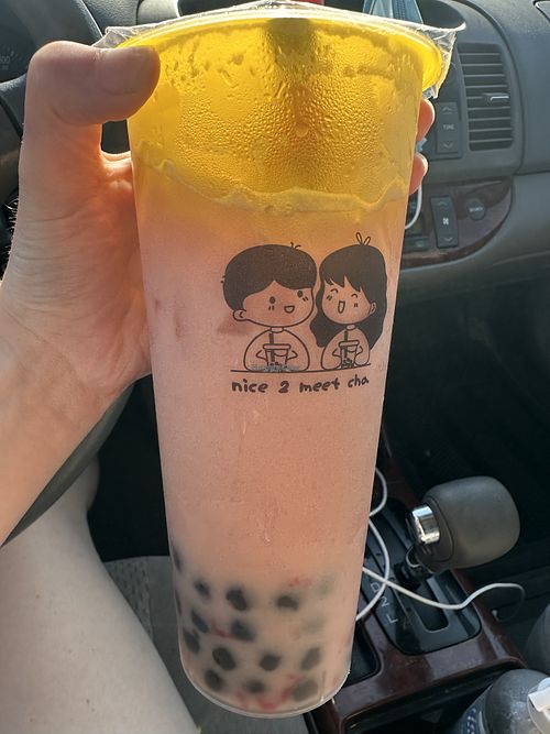 Strawberry milk tea with tapioca pearls and oatmilk   at Nice 2 Meet Cha in Maple Grove