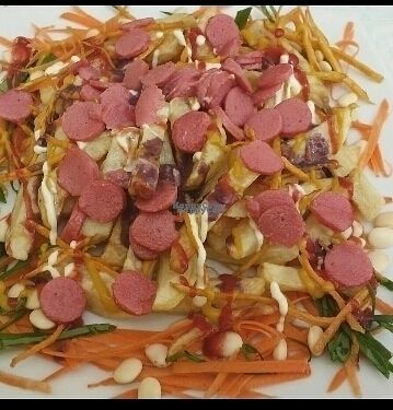 Salchipapas at Loving Hut - Titikaka in Puno