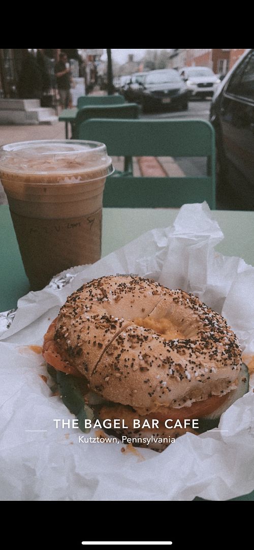 Coffee with hummus and veg bagel  at The Bagel Bar Cafe in Kutztown