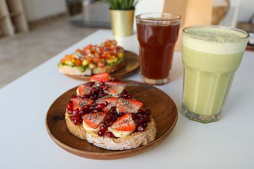 peanut butter toast with banana & strawberries at Sprout in Muscat