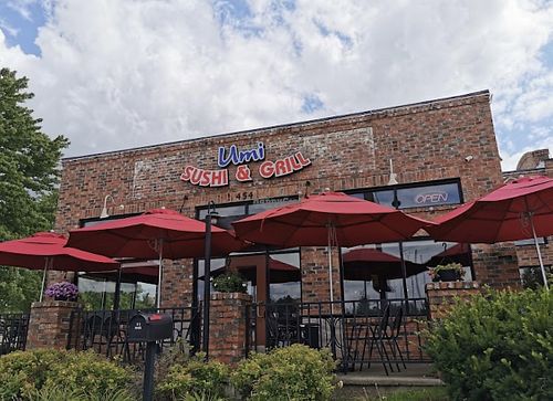 Outside of building. Outdoor seating only available when weather is good!😄 at Umi Sushi & Grill in Grand Rapids