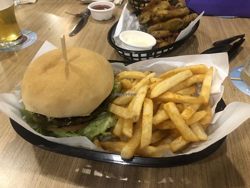 Burger and fries  at Your Mates Bowls Pub in Cooroy