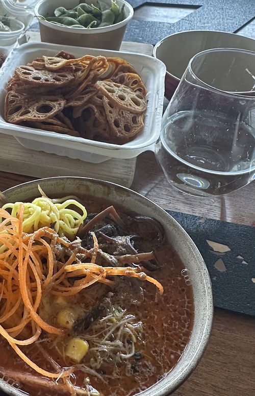 The red vegan broth, some lotus chips and edamame   at IROYUKI Ramen Bar in Kingston