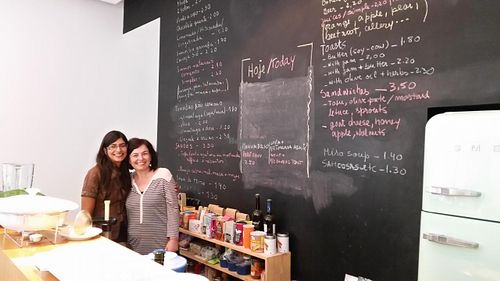 The lovely owner and staff member at Quintal Bioshop in Porto