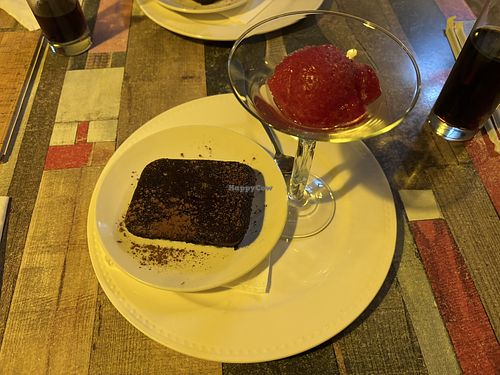 Chocolate Brownie with a frozen strawberry sauce  at Vegan e Meet in Johannesburg