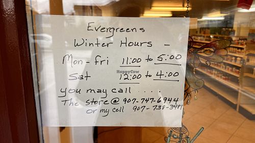 Opening times.  at Evergreen Natural Foods in Sitka