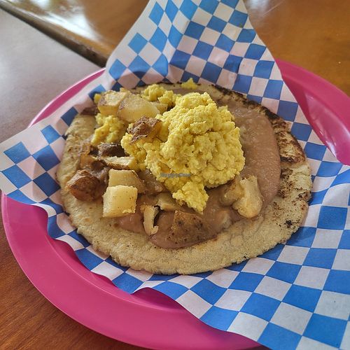 Refried beans, potatoes and egg on corn tortilla at Plantaqueria in San Antonio