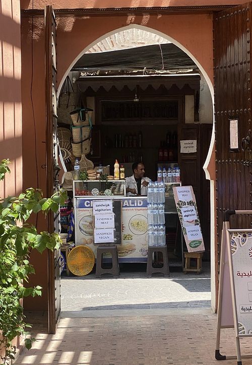 The lovely seller and his shop.  at Khalid's Vegetarian Sandwich in Marrakech