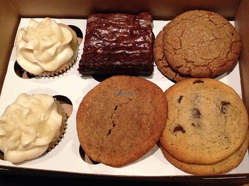 box of assorted goodies: salted caramel cupcakes, brownies, Snickerdoodle, Molasses, & chocolate chip cookies at Treehouse Bakery in Phoenix