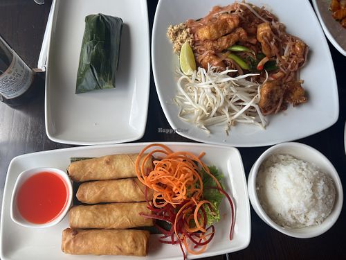 Sticky rice, tofu pad Thai, spring rolls, and steamed rice.   at Mai Thai Restaurant in Alexandria