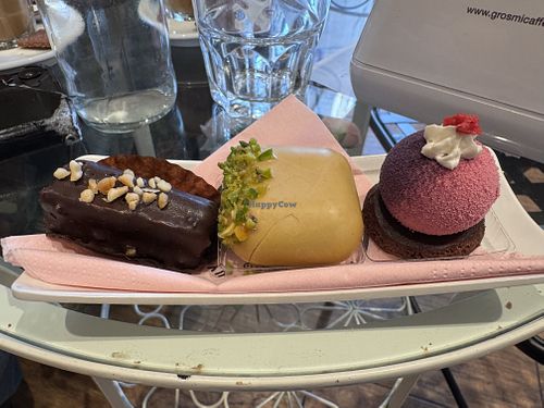 Chocolate praline, pistachio, and berry chocolate mini desserts  at Pasticceria da Ily in Trieste