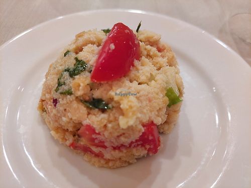 Free appetizer made of bread at Ristorante Taverna Di Cecco in Siena
