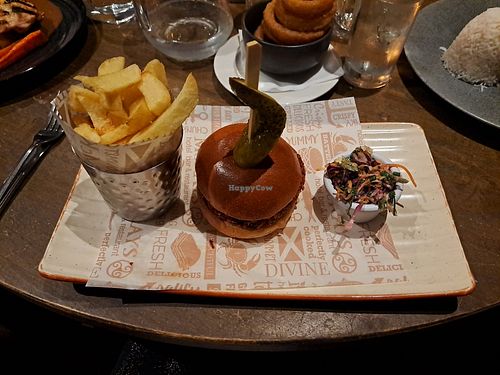 Burger with asian slaw and tons of chips at McKays Hotel, Bar & Restaurant in Perth And Kinross