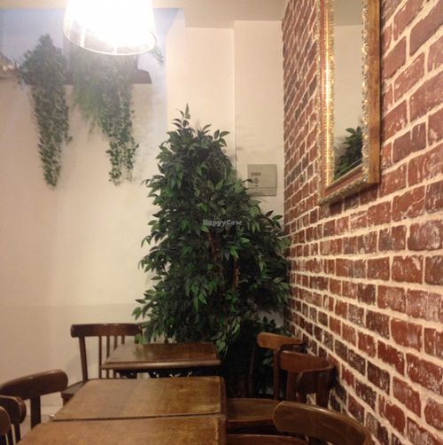 basement seating area at East Side Burgers in Paris