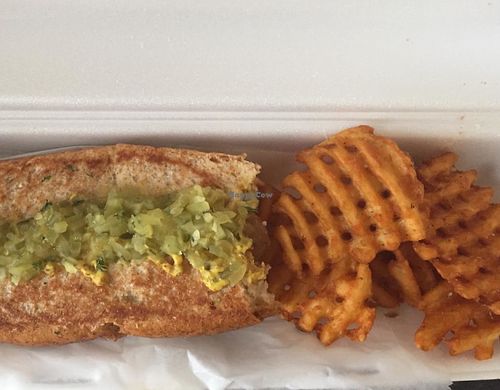 Kielbasa Vegan Dog with relish and mustard. Also seasoned waffle fries!! at Dreamy Weenies in New Orleans