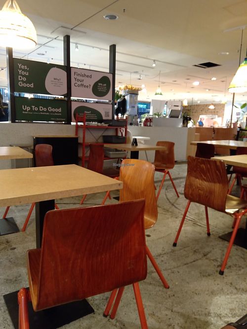 Inside the cafe (July 2025) at AMS - Up To Do Good in Schiphol