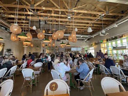 The inside is clean, light, and airy. Very comfortable.  at Flower Child in Tucson