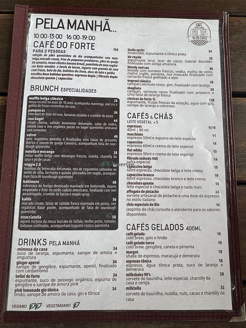 Menu! 1 leaf means vegetarian, 2 leaves mean vegan. And the brown circle means gluten free. Page 1  at Café 18 do Forte in Rio De Janeiro