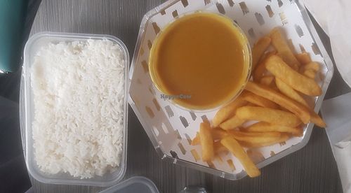 Rice, chinese curry sauce and chips (shared) at Noodz in Belfast