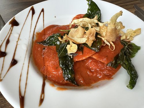 Ravioli (stuffed with chickpea and veggies, served in a tomato crème sauce with crispy parsnip, etc.)  at L'Osteria Italiana in York