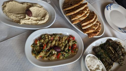 Mezze options including vine leaves. at Taverna Ouzaki in Rhodes