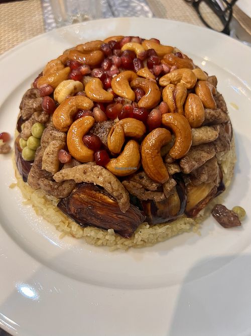 Aubergine and mock meat rice-based middle-eastern dish  at Vegano Mezo in Berlin