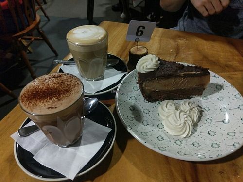 choc peanut butter cake, hot chocolate & latte. all vegan.  at Giri Kana Cafe in Southport