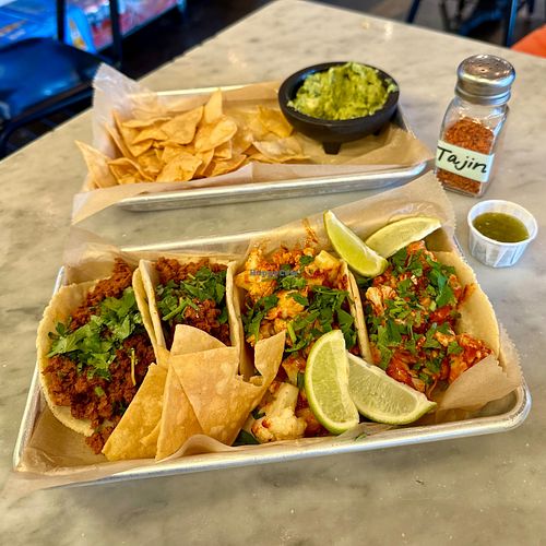 A couple of Impastor tacos on the right (cauliflower prepared al pastor style) & to soy chorizo on the left. Chips and guac mandatory if it comes in one of those little heavy bowls at Tight Tacos in Portland
