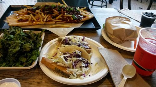 Fish tacos, kale chips, blt, chili cheese fry pizza, and watermelon juice at Healthy Junk in Anaheim