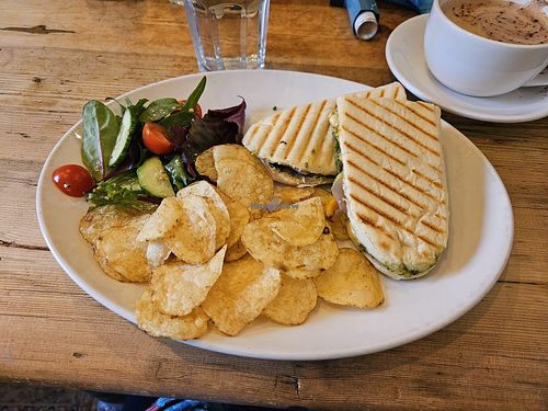 Vegan roast veg, pesto and vegan cheeze panini served with crisps and side salad at Nosh in Pickering