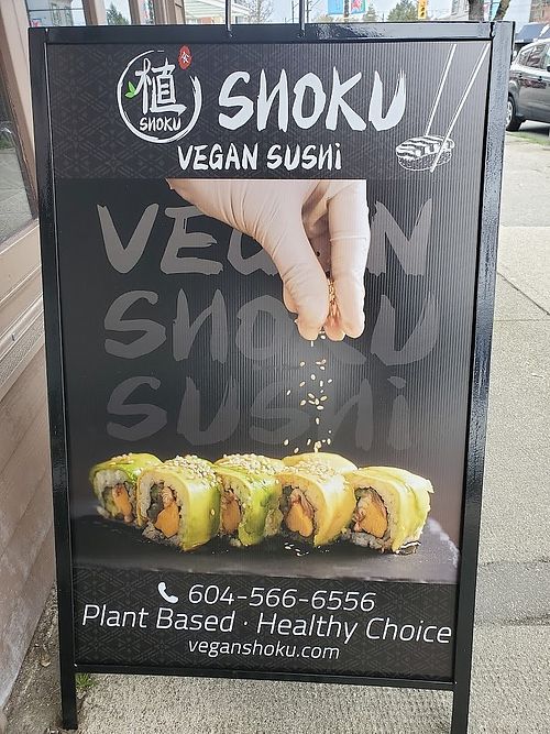 sign outside restaurant at Vegan Shoku in Vancouver