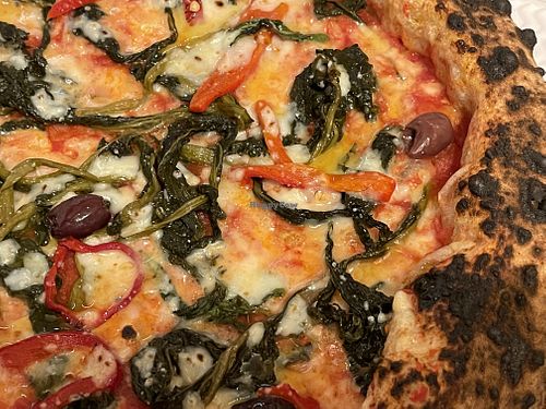 Calzone (stuffed with vegan mozzarella, deep-fried aubergines and mushrooms) and vegan margherita topped with friarielli, black olives and bell peppers   at Sacro Dough Pizza in North West London
