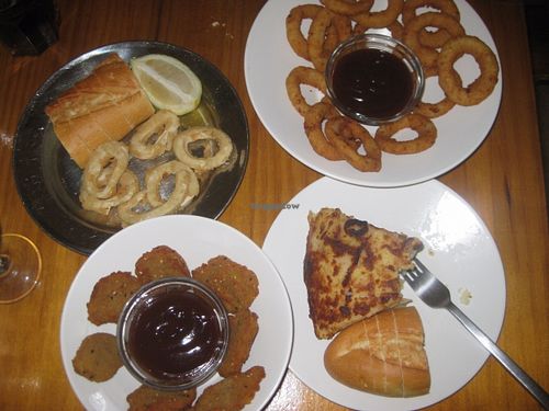 Calamares, onion rings, tortilla, St Jacobs at B13 Bar in Madrid