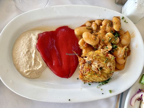 Hummus, pepper, giant beans, stuffed zucchini flower  at Xenious Zeus in Athens