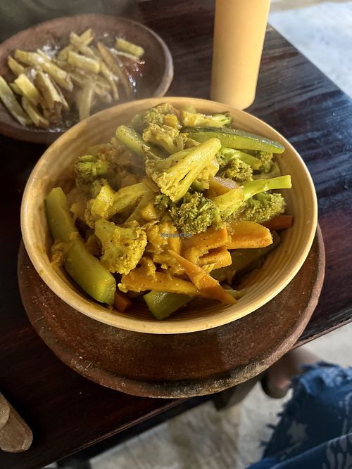 Curry and a side of fries  at Bhakti House Ayampe  in Ayampe