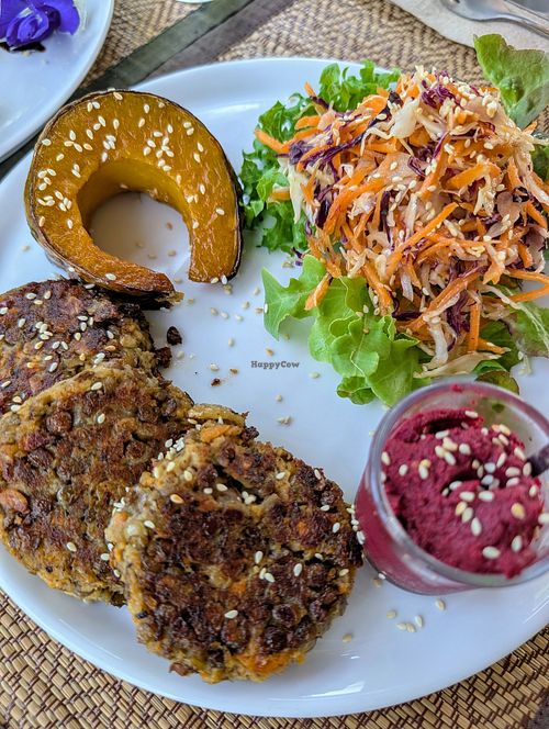 Mushroom and lentil patties with beetroot hummus at Soulscape Café in Koh Phangan