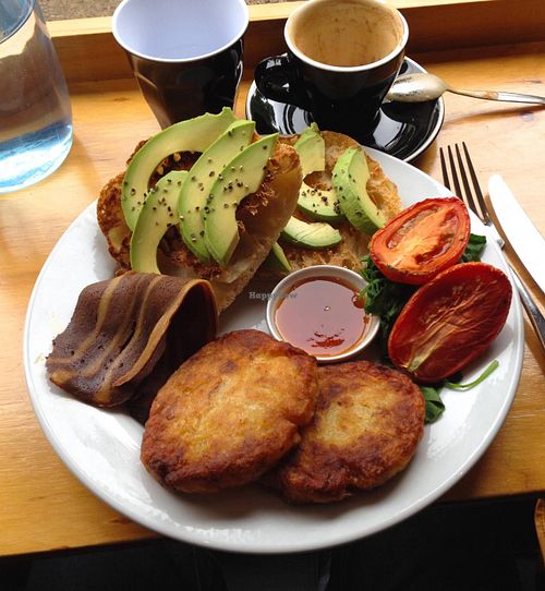 Hash browns, smokey rasher, toast, avocado, roasted tomato and baby spinach at Suzy Spoon's Vegetarian Butcher in Marrickville