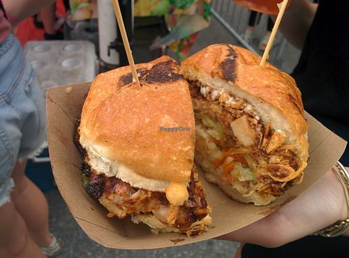 Pulled BBQ jackfruit sandwich; slaw, pickles, shallots, horseradish aioli on a potato bun at Chickpea & Olive in Brooklyn